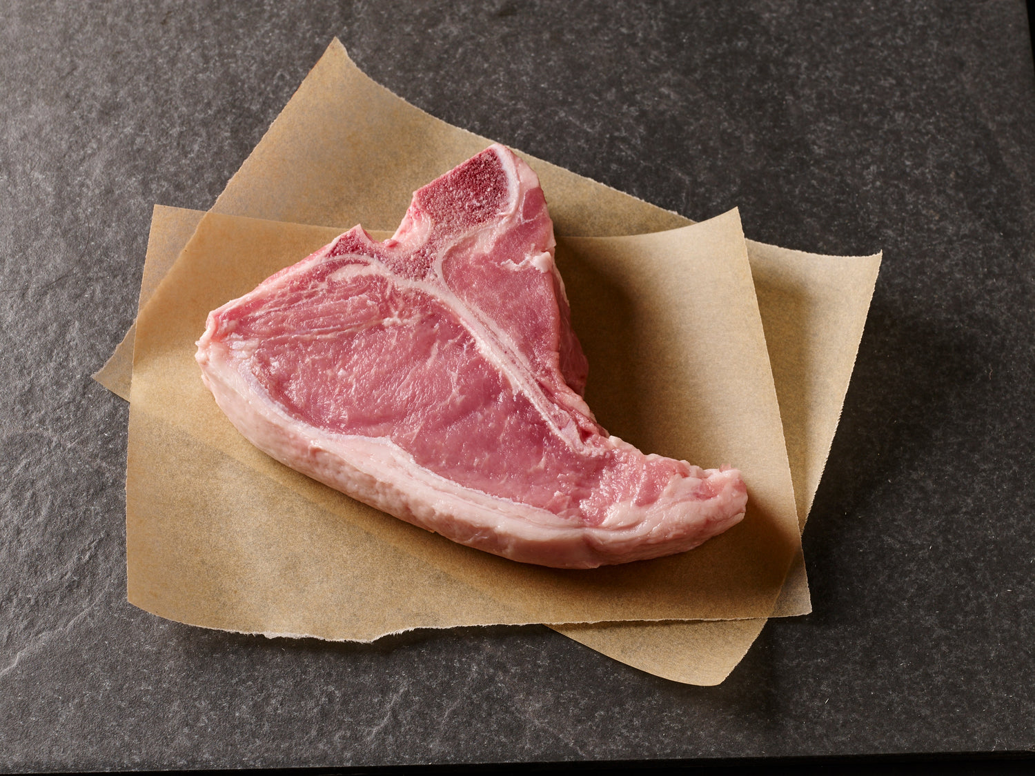 Pan-Roasted Veal Chops with Applejack Sauce and Caramelized Onion and Apple Hash